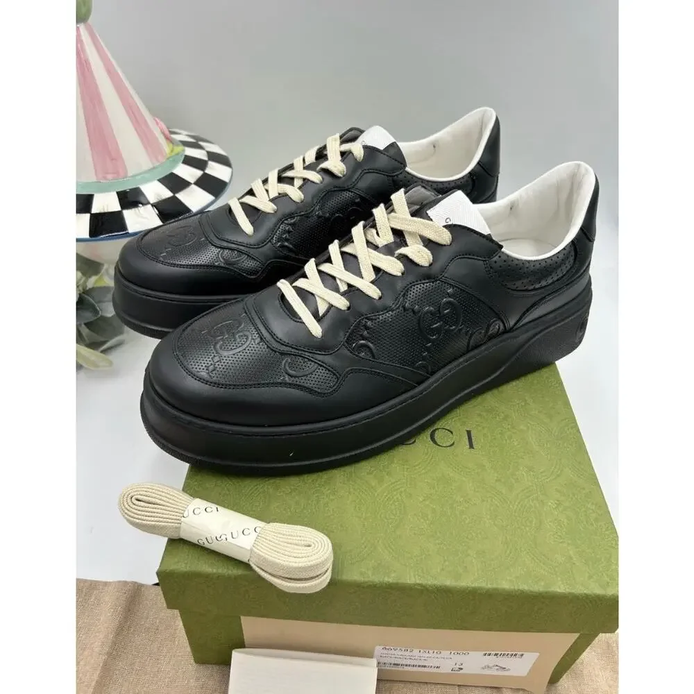 Men's Gucci, GG embossed leather sneakers size 13 fits 13.5 US made in Italy
